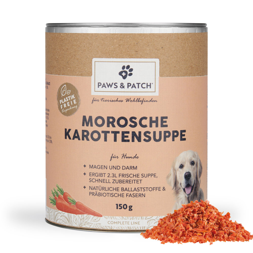 Dose mit Aufschrift Morosche Karottensuppe, davor ein Häufchen ausgepackte Karottenraspel